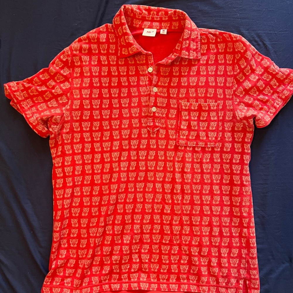 Uniqlo Michael Bastian Lucky Cat red polo shirt.